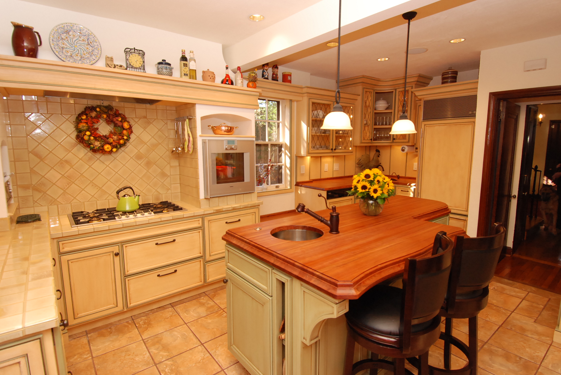 Warm Farmhouse Kitchen - Cabinets by Graber